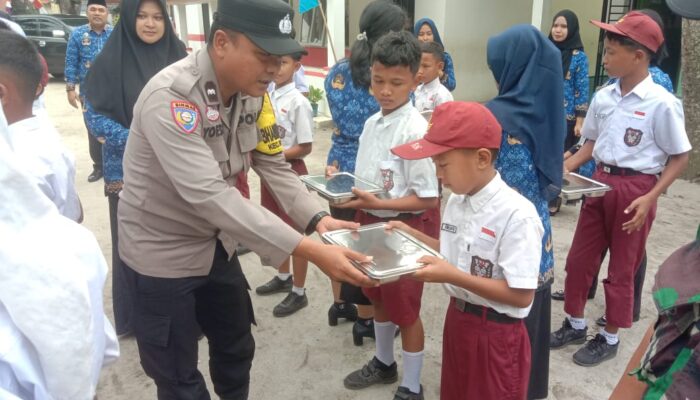 Polres Sergai Dampingi Peninjauan Perdana Program Makan Bergizi Gratis (MBG) di SD Negeri Kota Pari