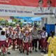 Brimob Sumut Tunjukkan Kepedulian: Antar Pelajar SD Pulang Sekolah dengan Aman dan Penuh Kehangatan