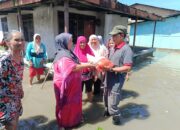 Ketua SMSI Sergai Turun Langsung Bantu Korban Banjir di Sei Rampah