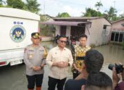 5.000 Paket Makan Bergizi Dibagikan, Deputi BGN RI,Kapolres dan Wabup Sergai Tinjau Banjir di Tanjung Beringin