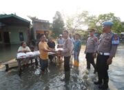 Wujud Kepedulian Kapolda Sumut, Kapolres Sergai Salurkan Sembako untuk Warga Terdampak Banjir di Tanjung Beringin
