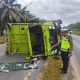 Hendak Hindari Genangan Air, Truk Tronton Terguling Hantam Pembatas Jalan di Jalinsum Sergai